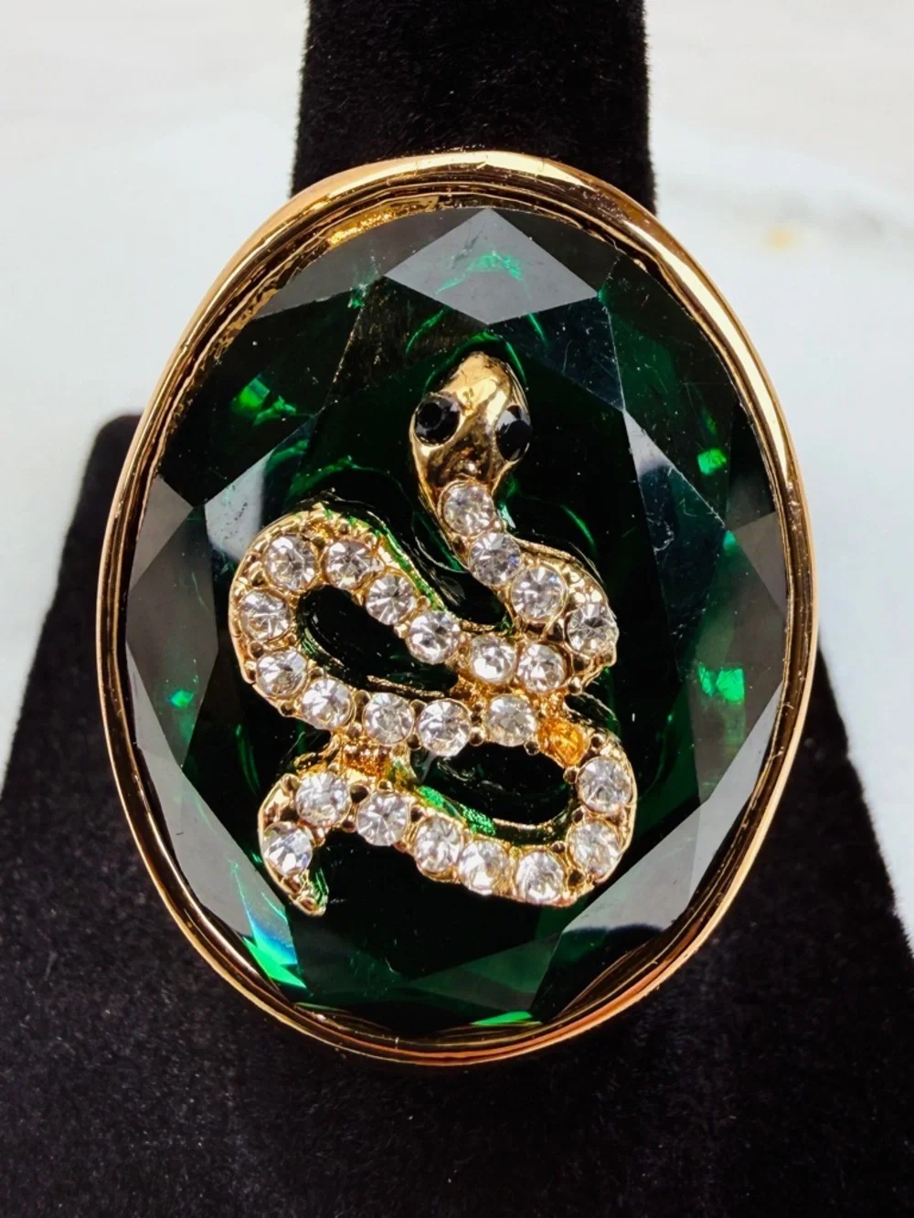 Beautiful, goldtone, emerald green bling snake statement ring